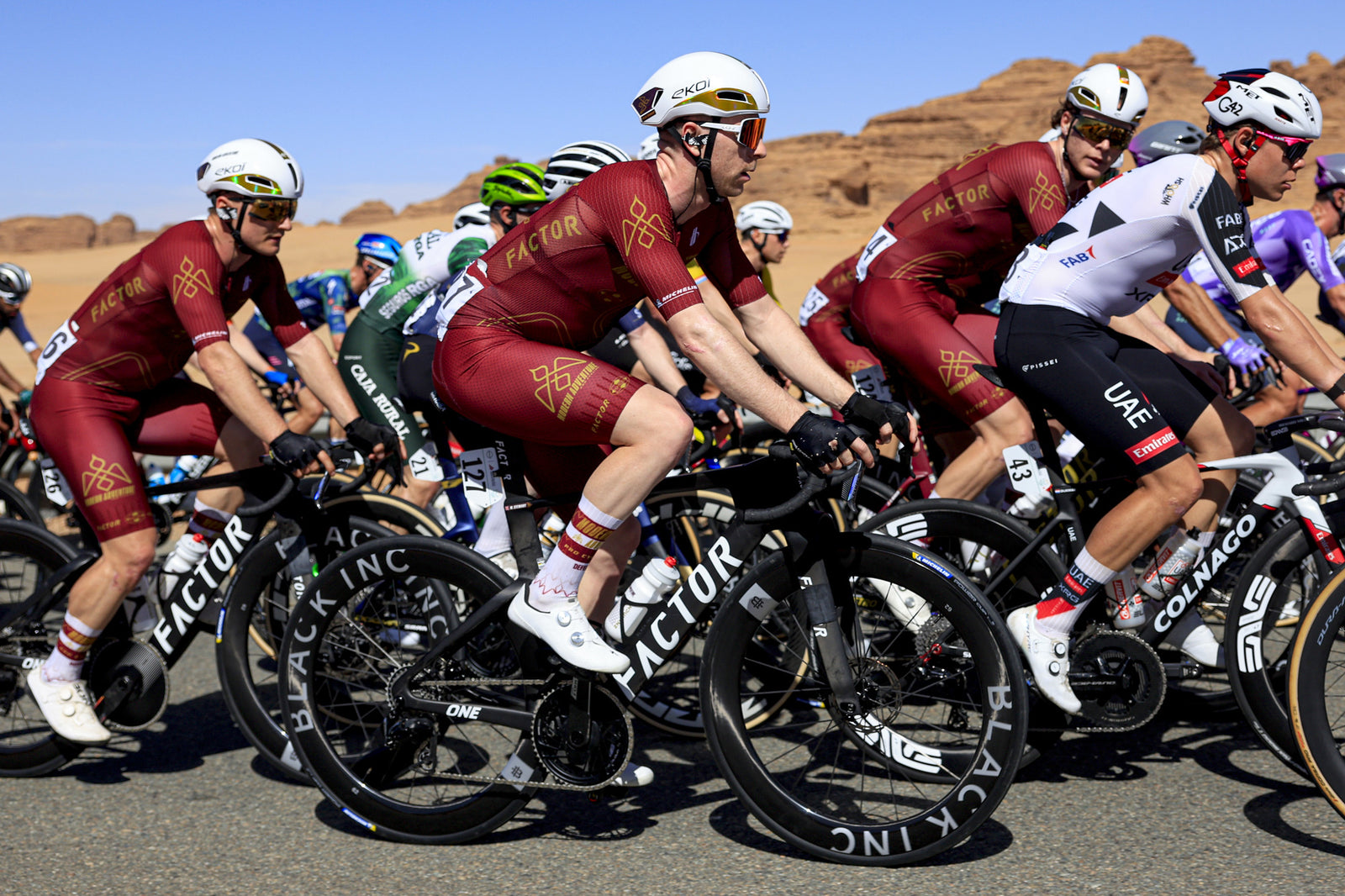 Modern Adventure Pro Cycling riders wearing DeFeet EVO Jet Aero cycling socks racing in the desert